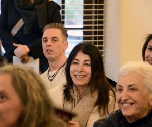 A group of people smiling